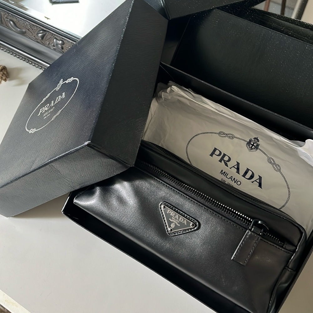 Authentic Prada, Milano, black bag in soft calf leather. New never used. FIRM